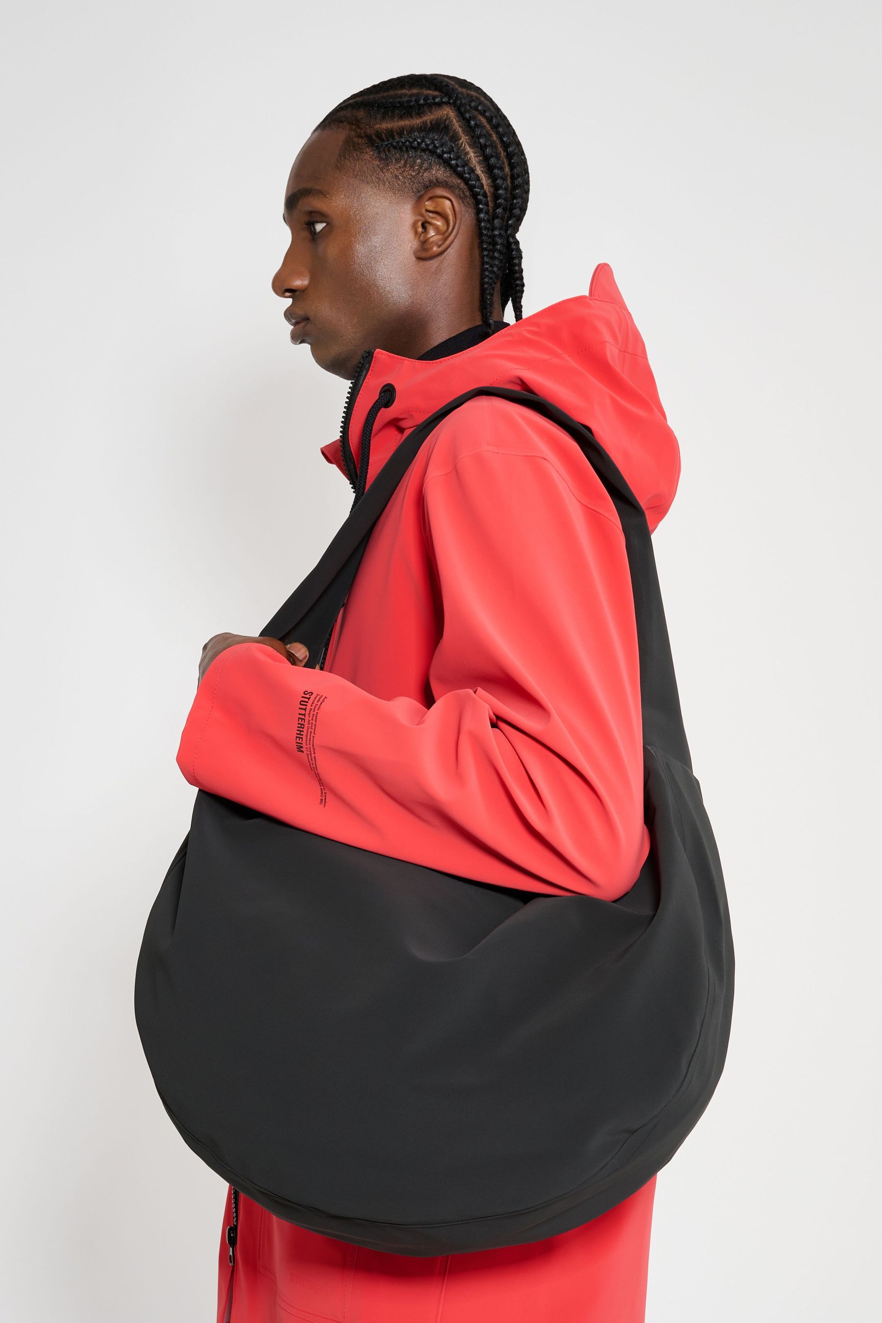 stutterheim adam bag matte black accessories bags crossbody-bags
