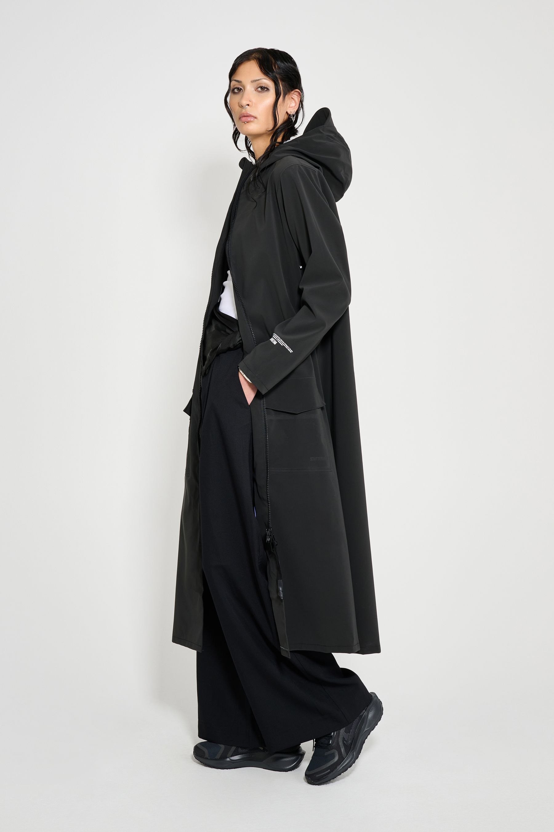 stutterheim mosebacke long patch raincoat black women jackets long-raincoats