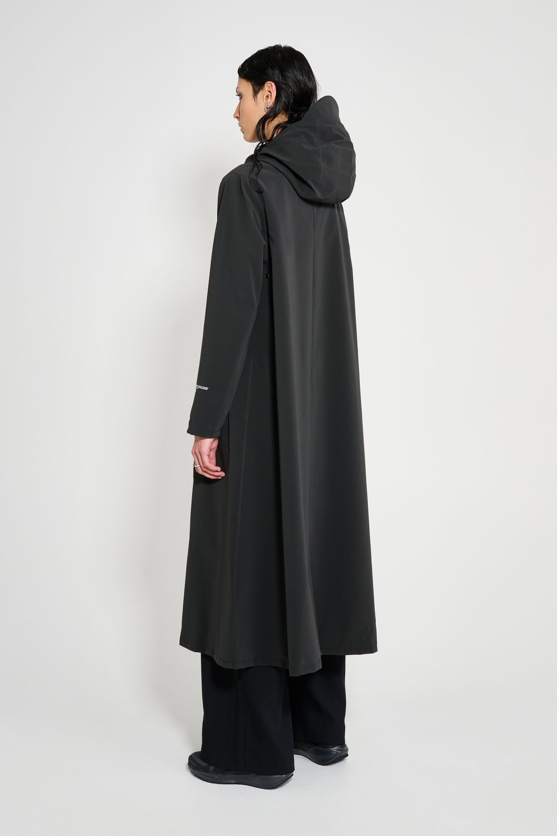 stutterheim mosebacke long patch raincoat black women jackets long-raincoats