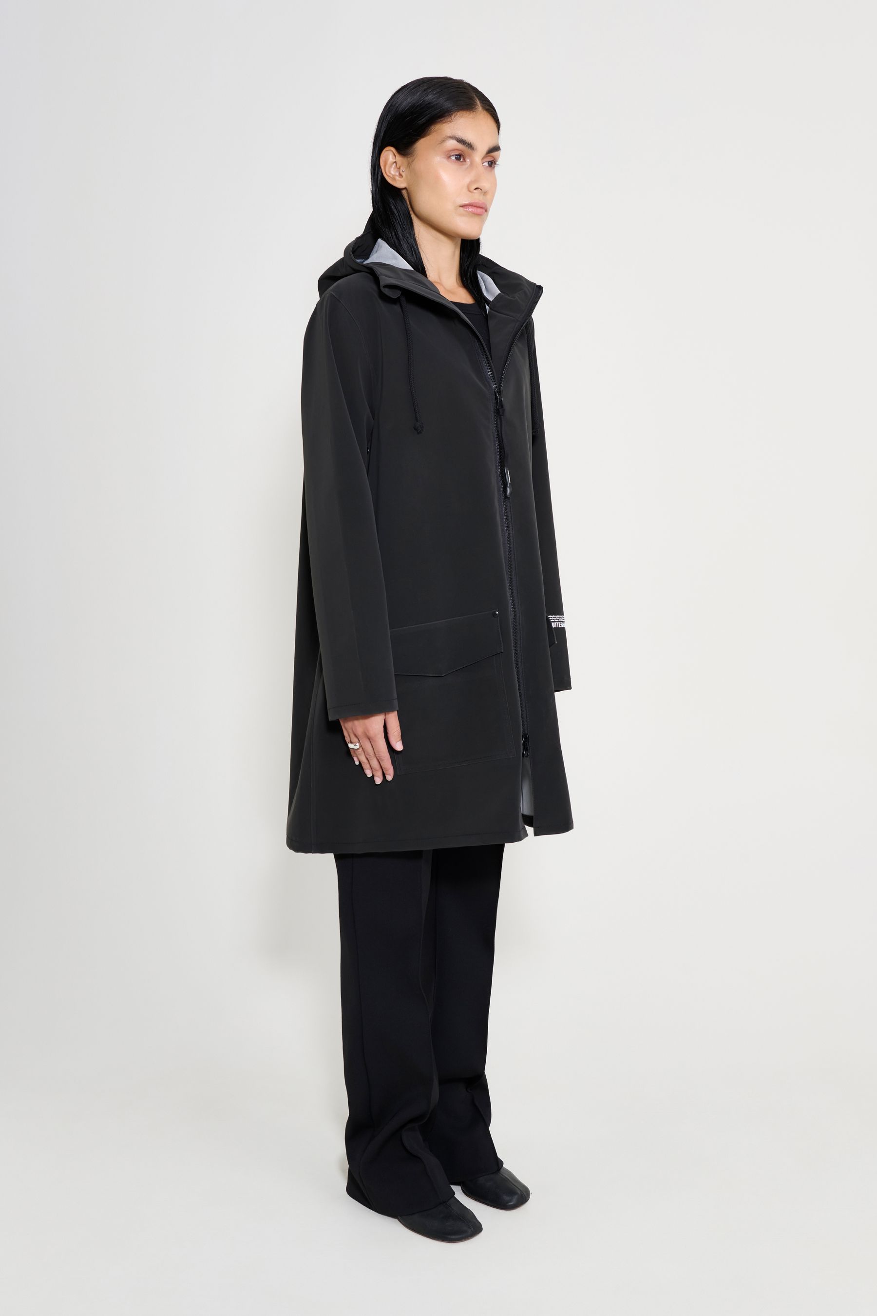 stutterheim mosebacke patch raincoat black women jackets raincoats