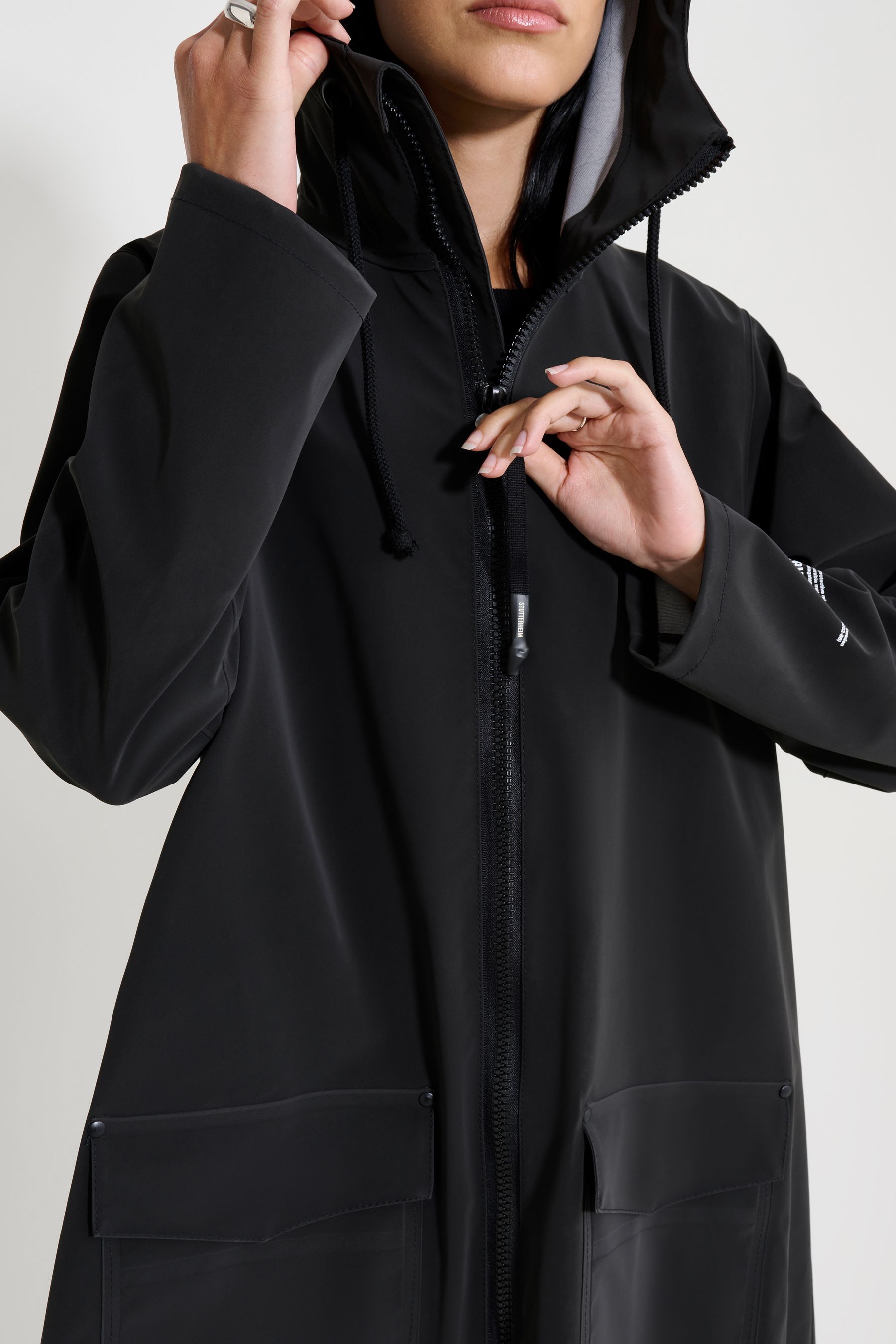 stutterheim mosebacke patch raincoat black women jackets raincoats