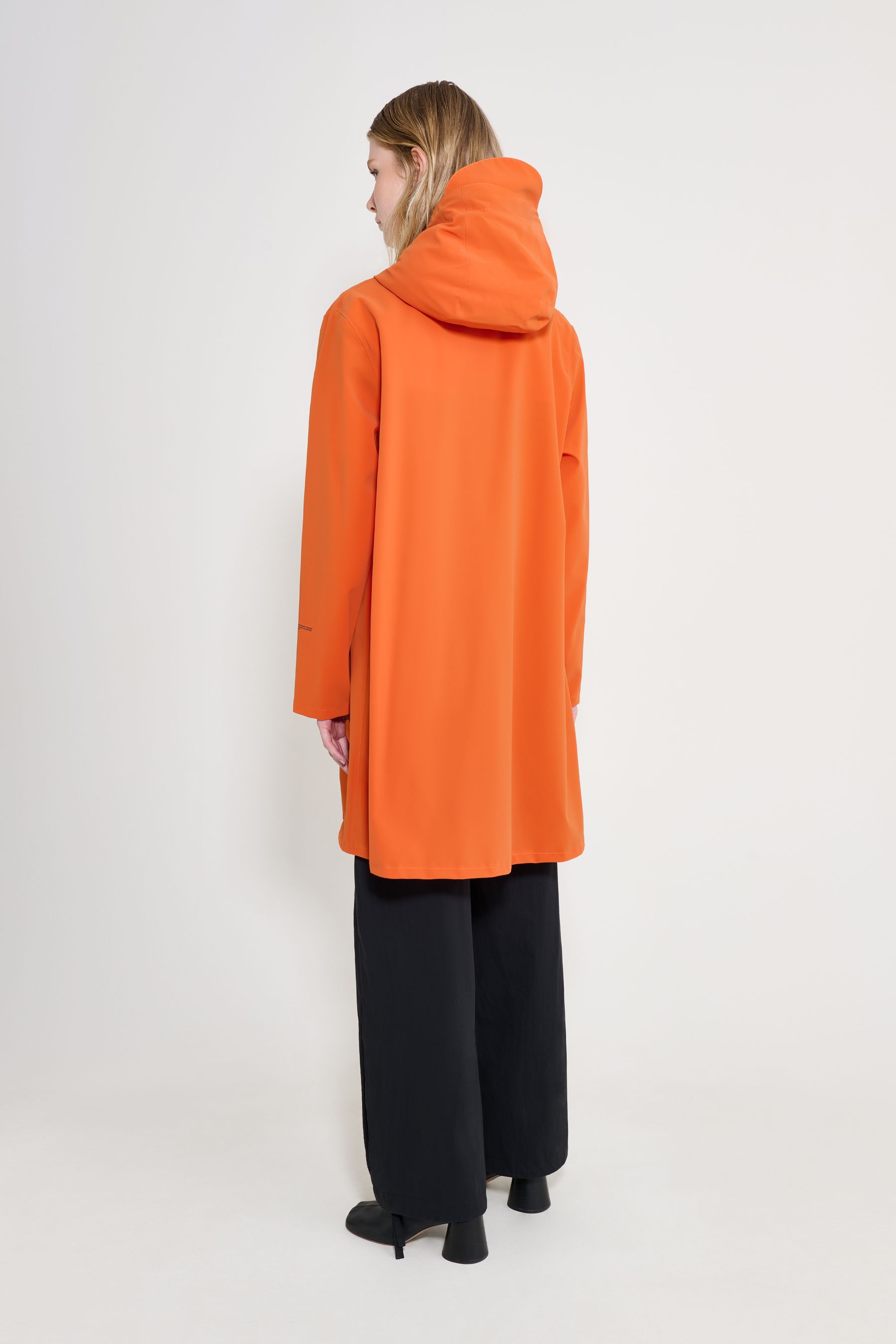stutterheim mosebacke patch raincoat pumpkin women jackets raincoats