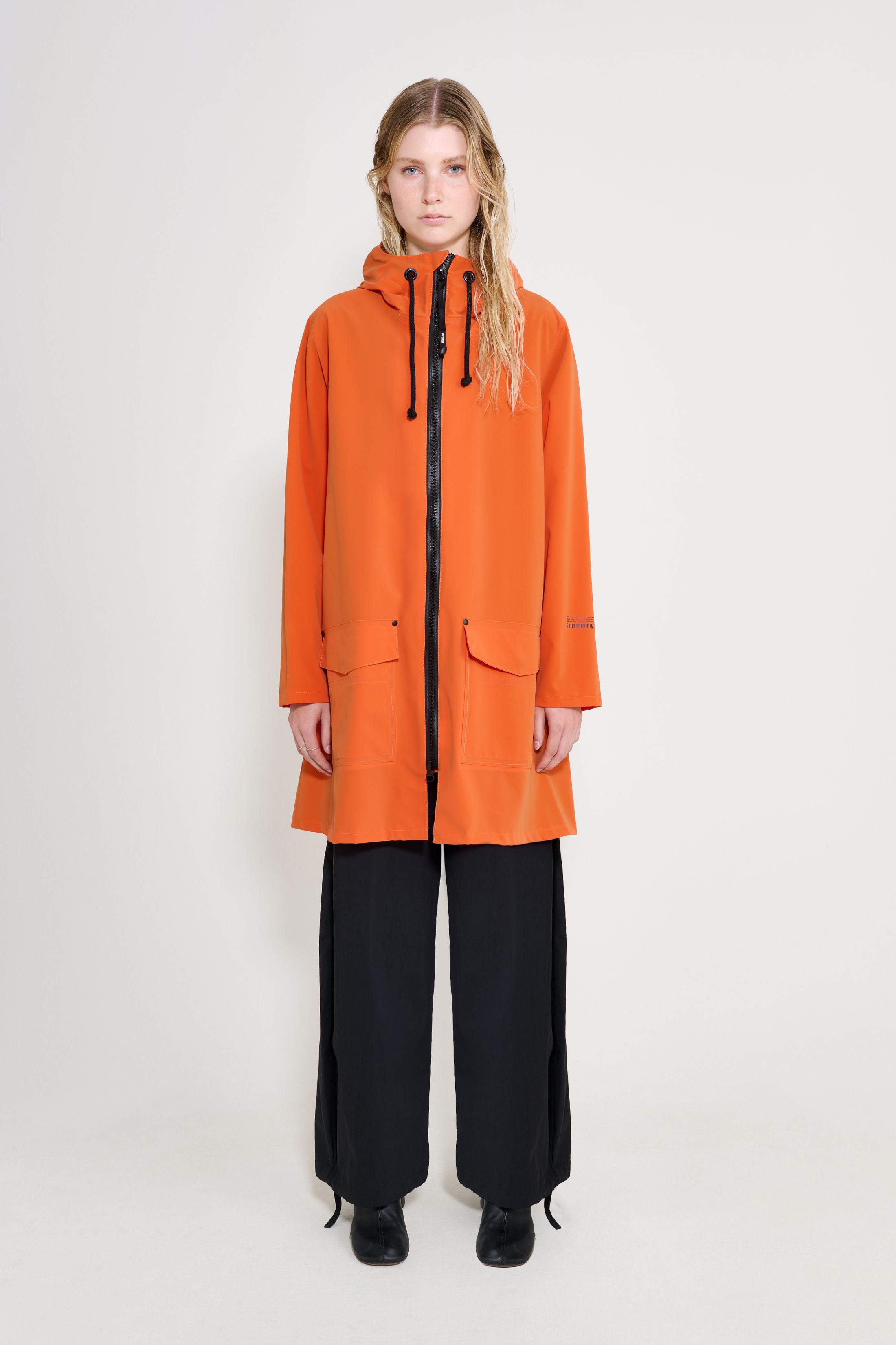 stutterheim mosebacke patch raincoat pumpkin women jackets raincoats