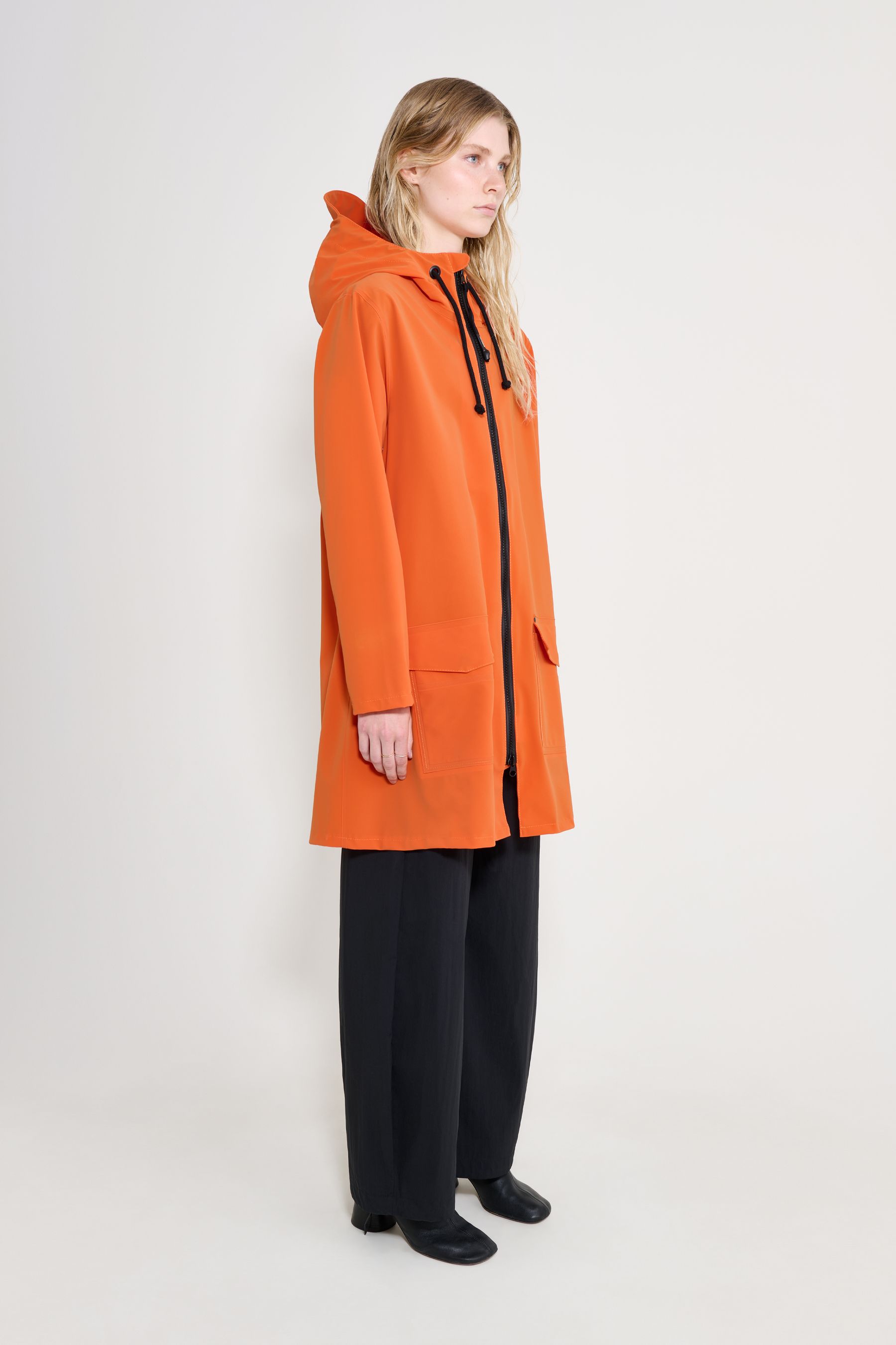 stutterheim mosebacke patch raincoat pumpkin women jackets raincoats