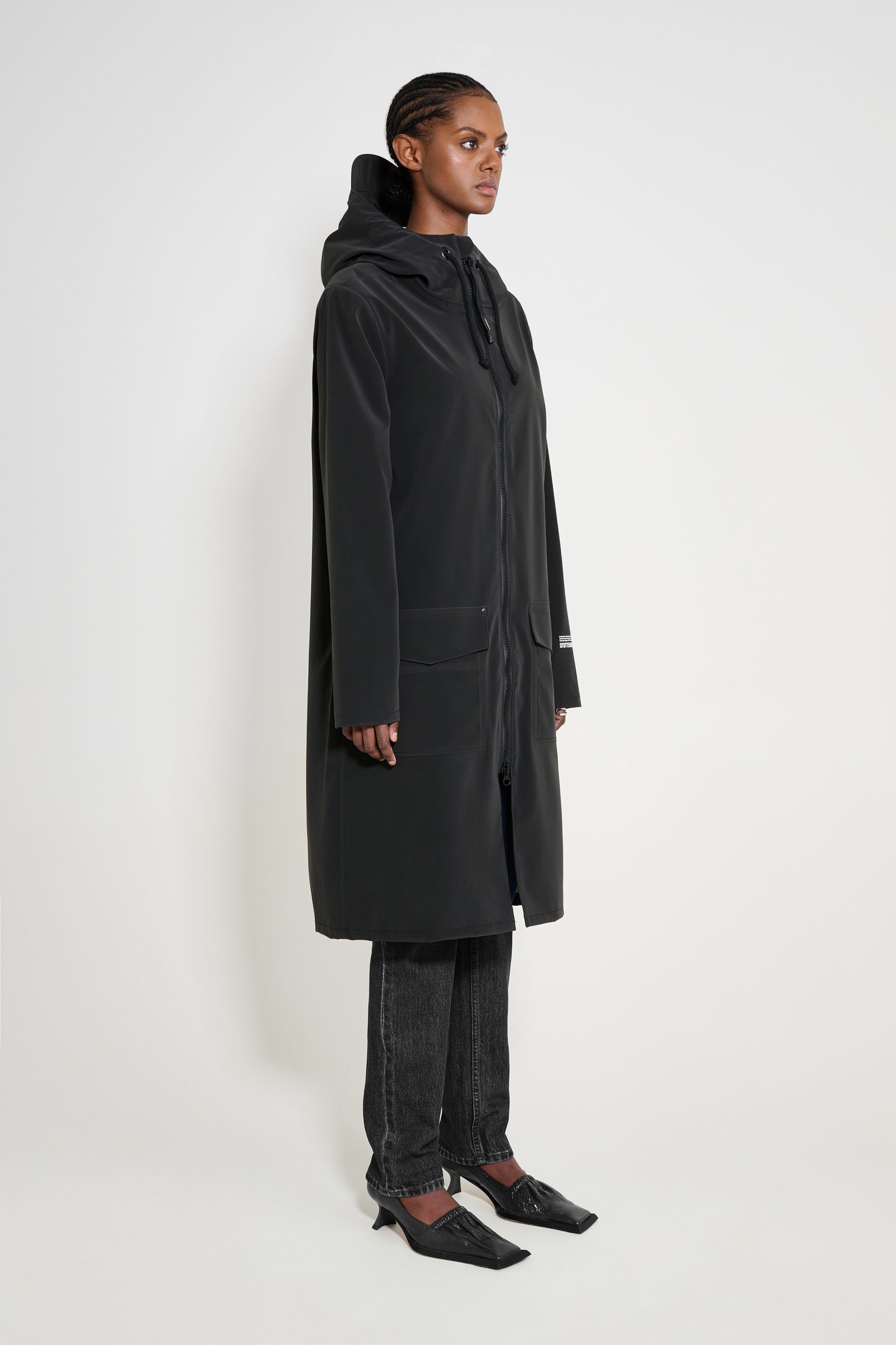 stutterheim stockholm long patch raincoat black women jackets long-raincoats