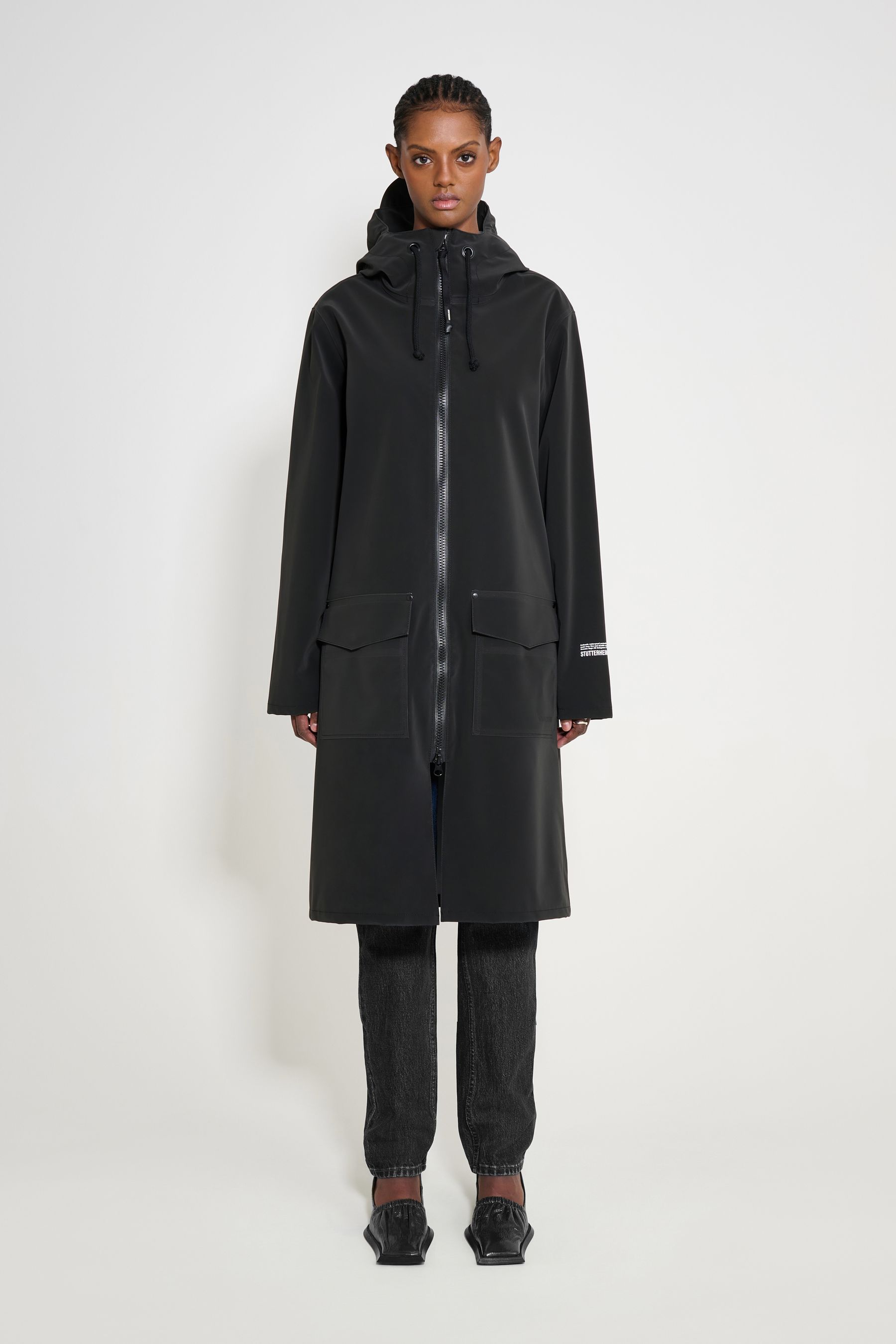 stutterheim stockholm long patch raincoat black women jackets long-raincoats