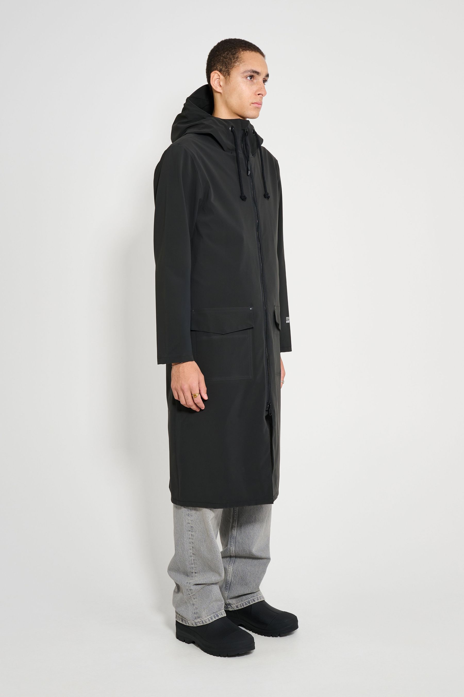 stutterheim stockholm long patch raincoat black men jackets long-raincoats