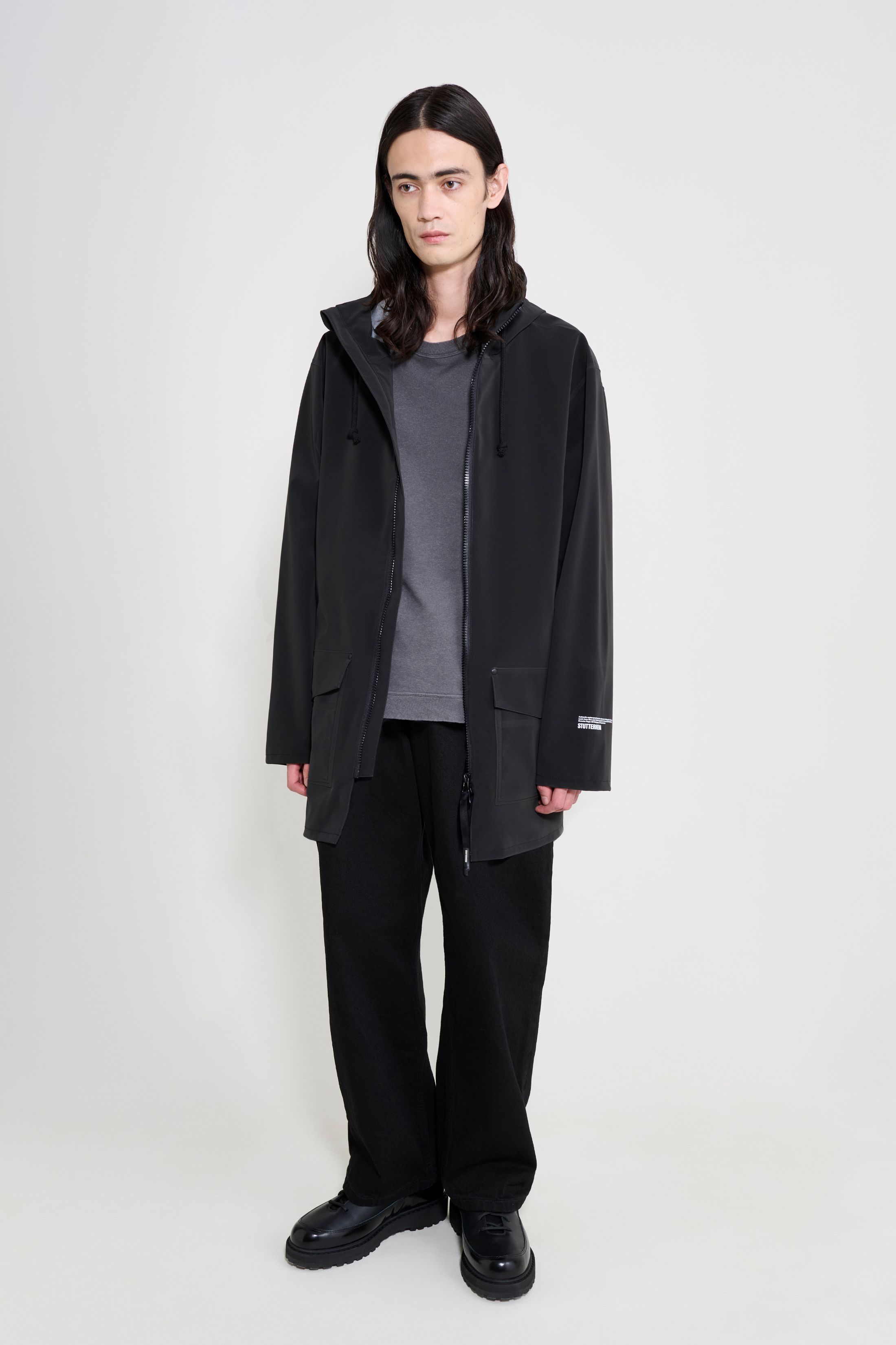 stutterheim stockholm patch raincoat black men jackets raincoats