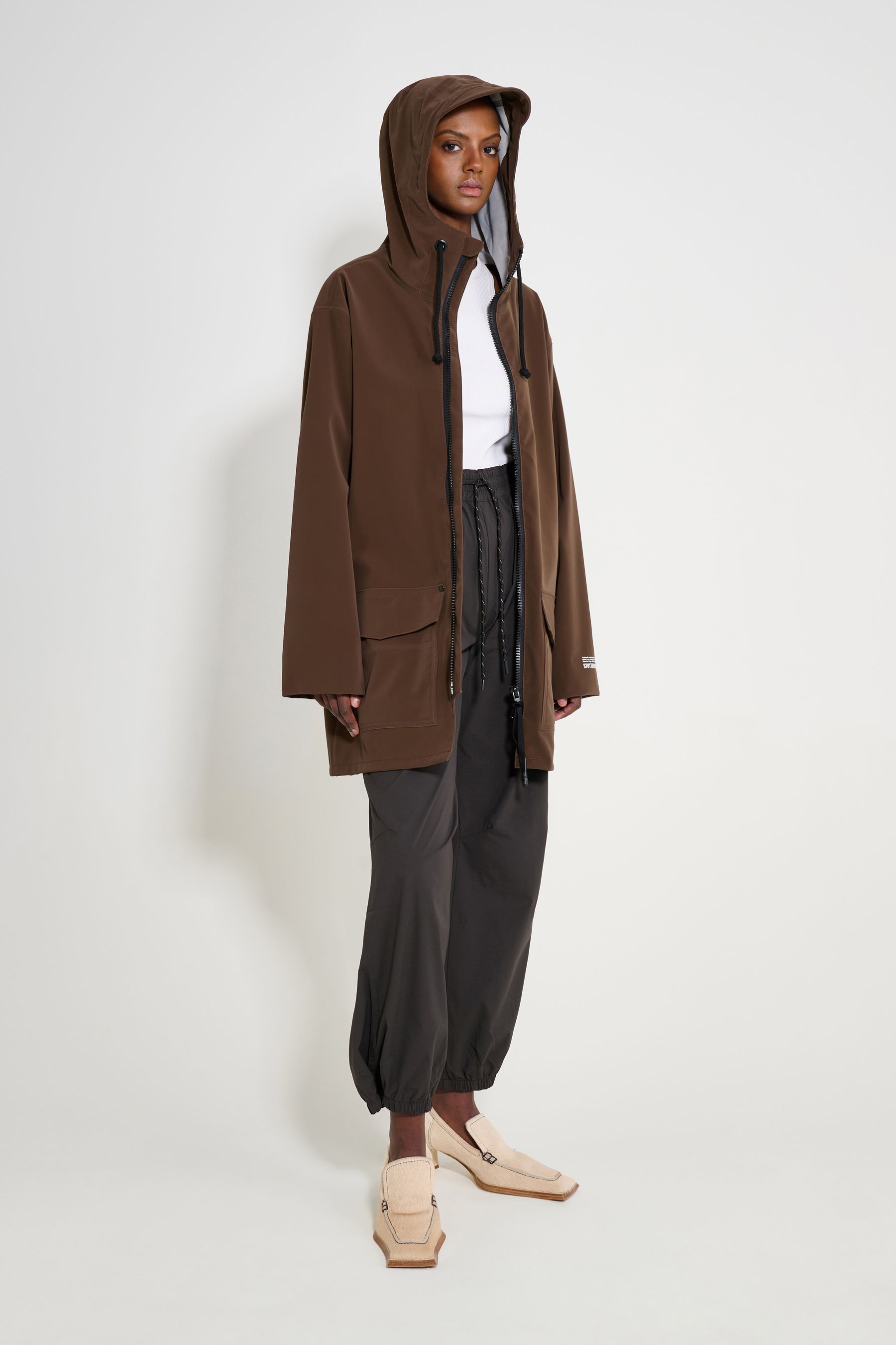 stutterheim stockholm patch raincoat dark brown women jackets raincoats