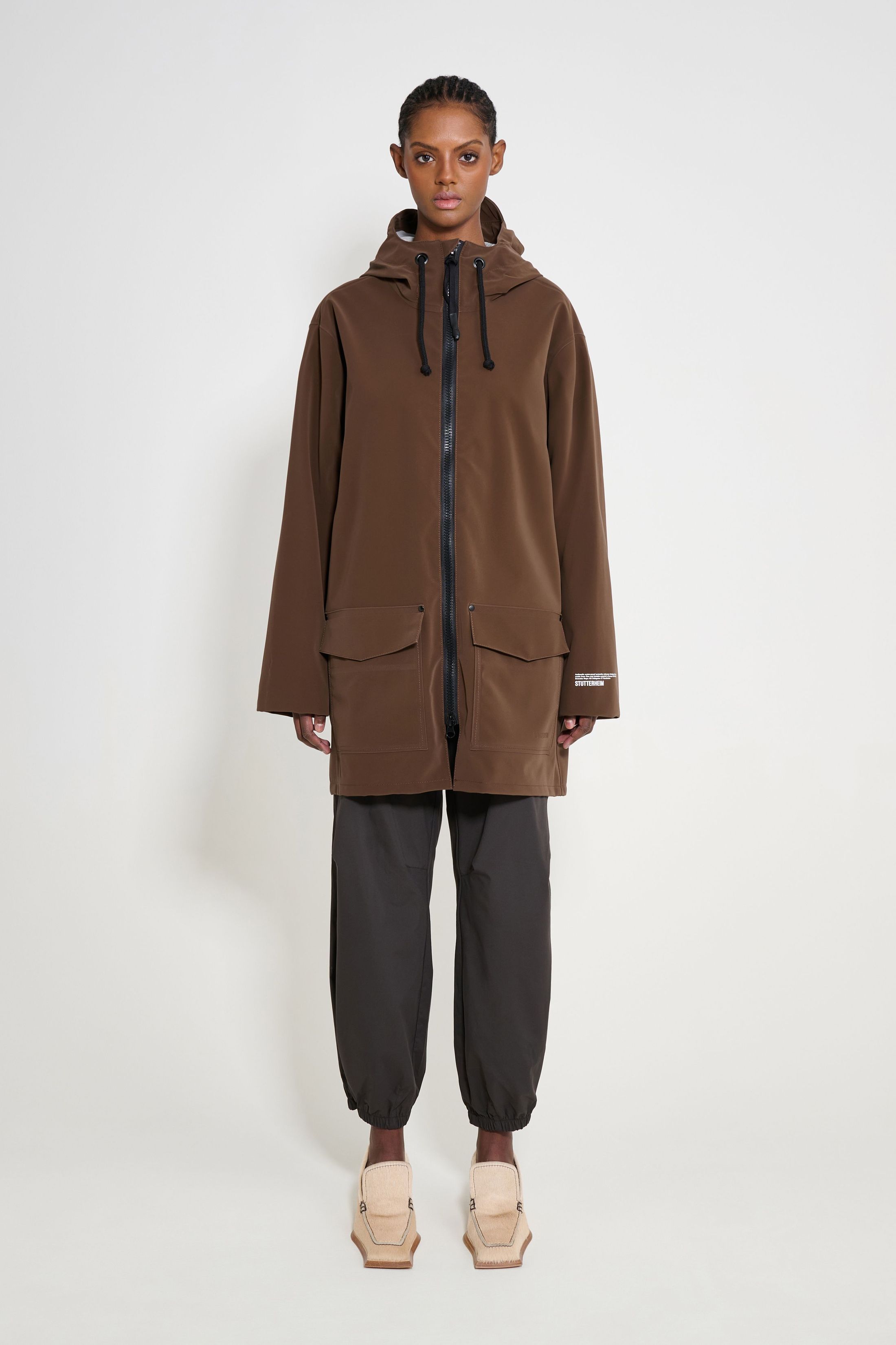 stutterheim stockholm patch raincoat dark brown women jackets raincoats