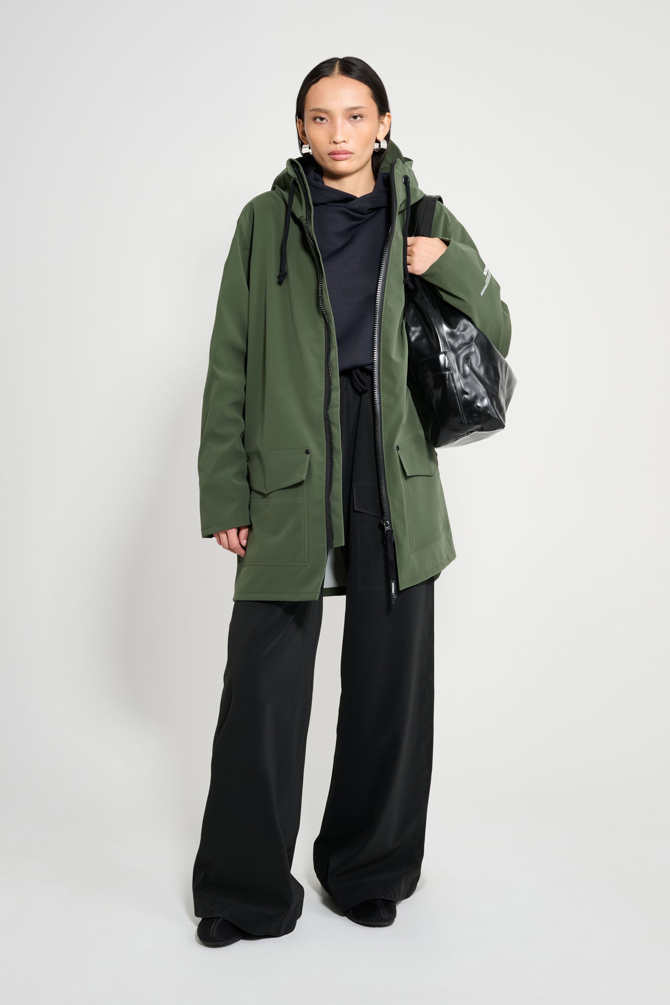 stutterheim stockholm patch raincoat green women jackets