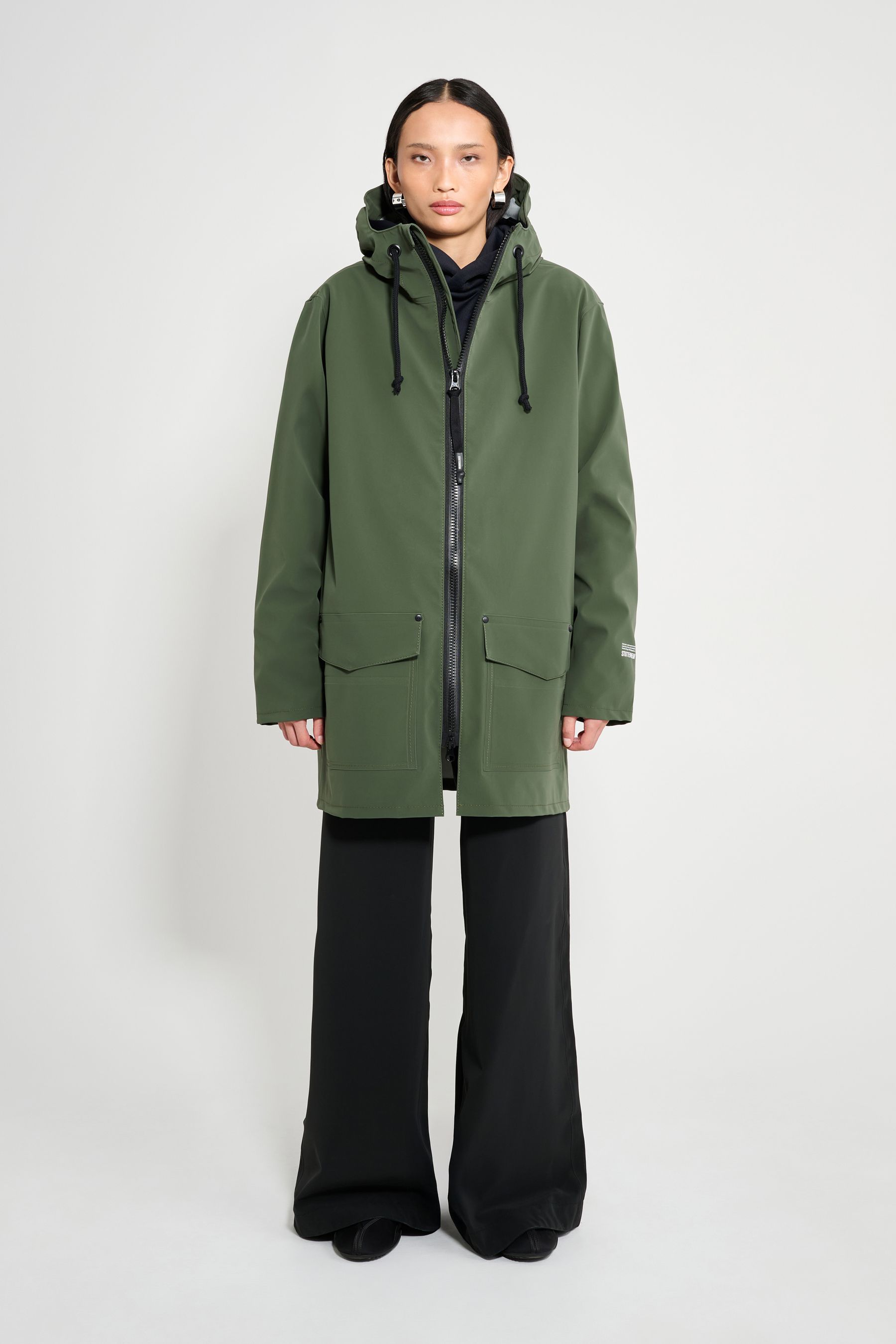 stutterheim stockholm patch raincoat green women jackets