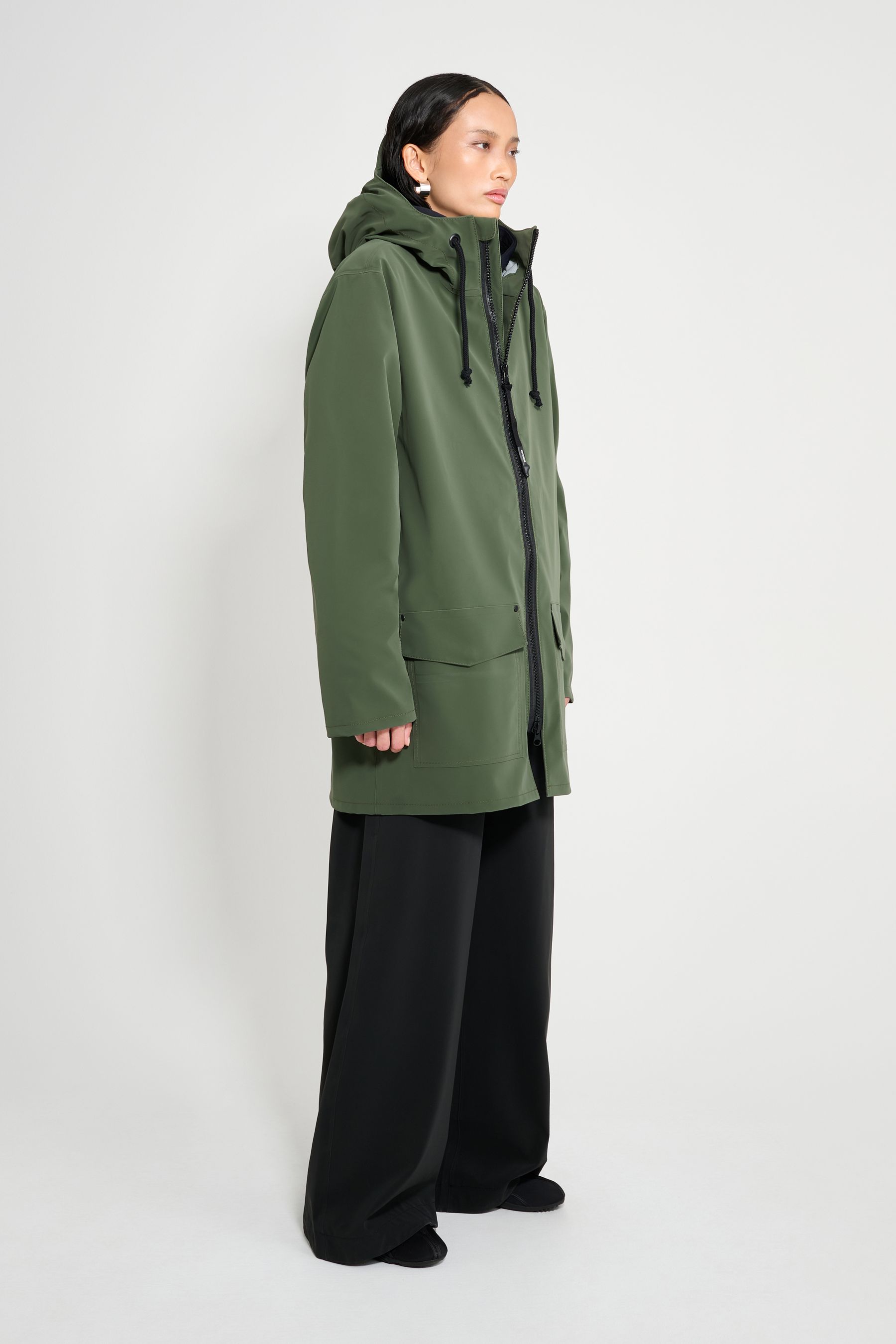 stutterheim stockholm patch raincoat green women jackets