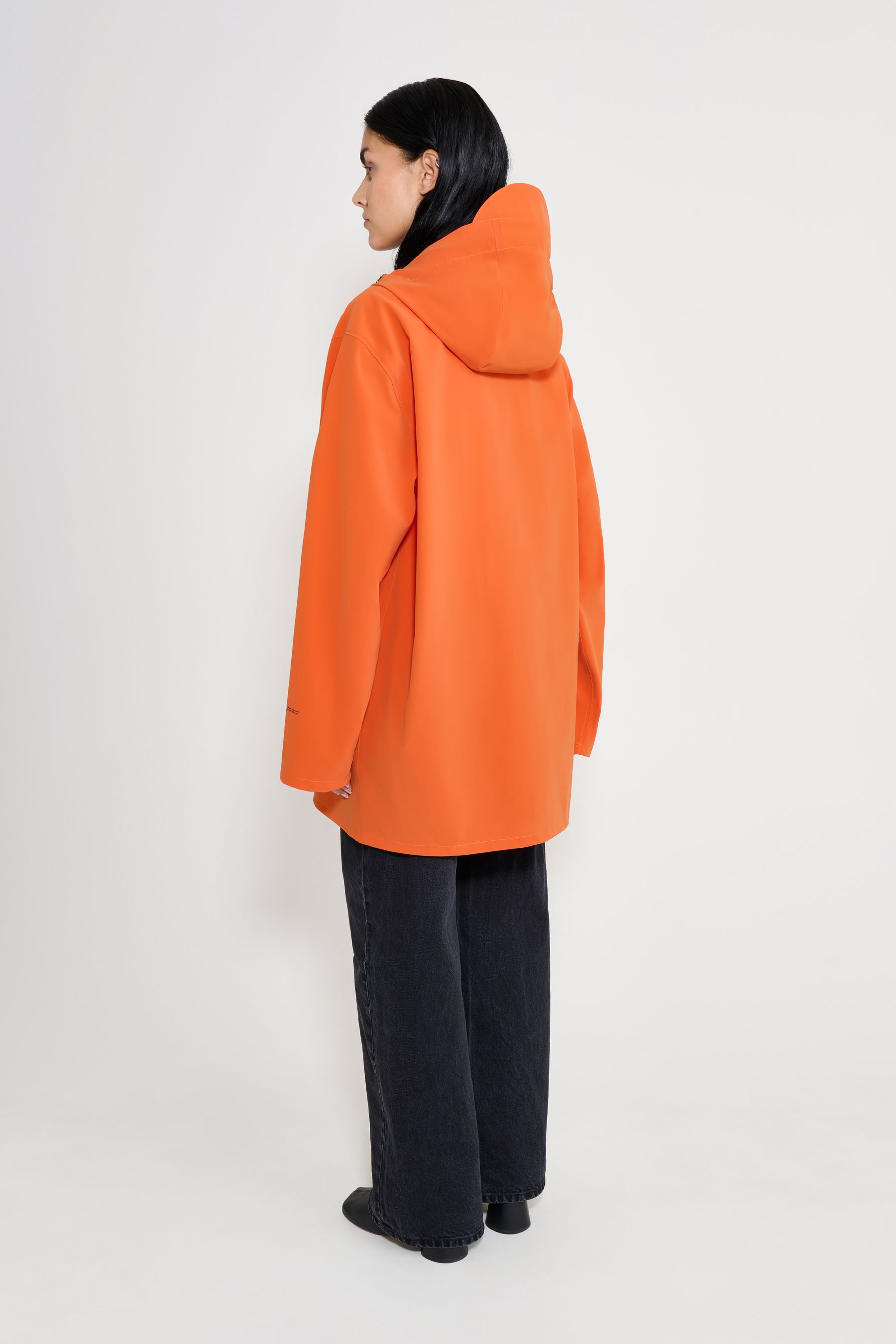 stutterheim stockholm patch raincoat pumpkin women jackets raincoats