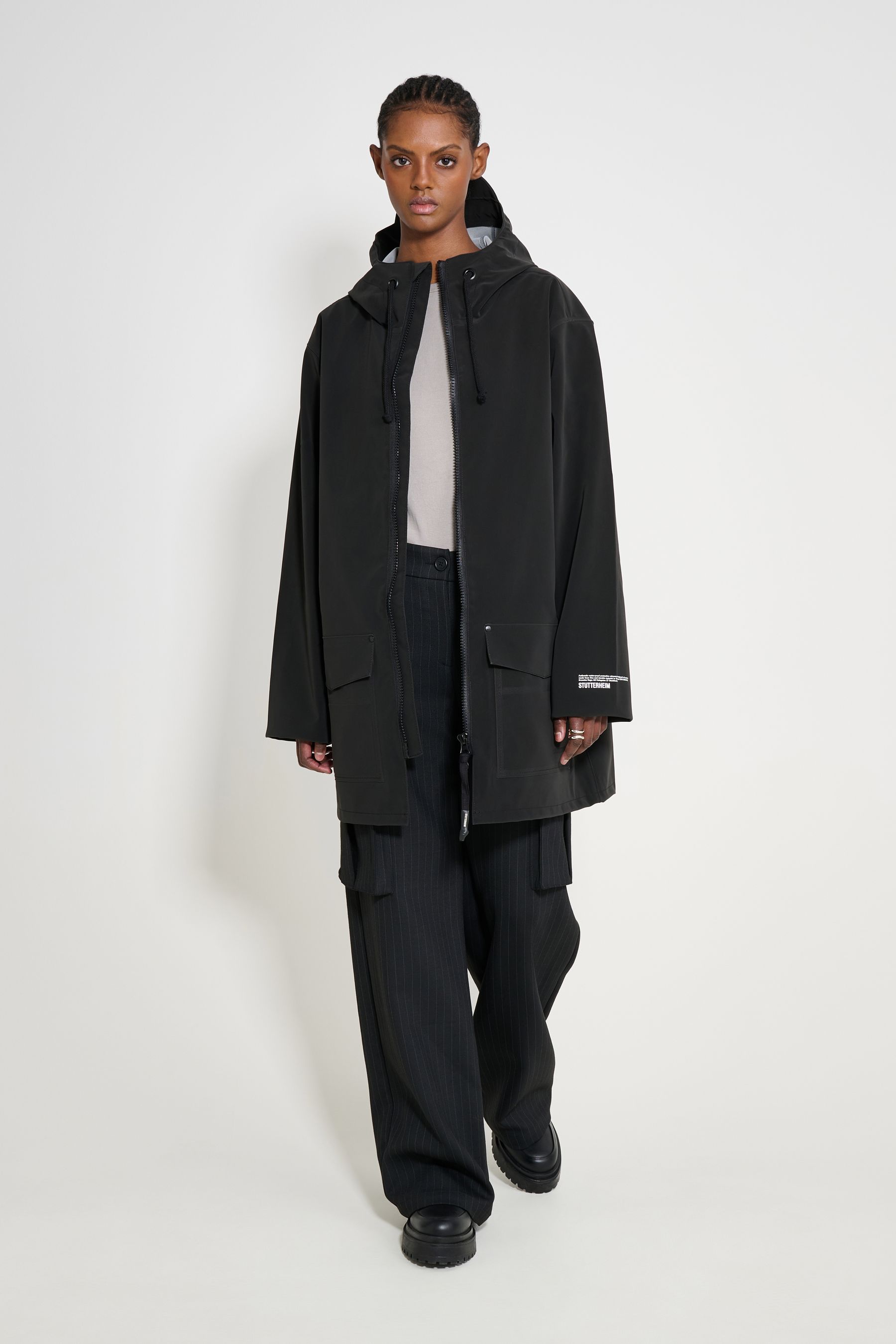 stutterheim stockholm patch raincoat black women jackets raincoats